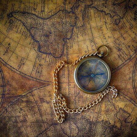 Vintage compass on old mapの写真素材
