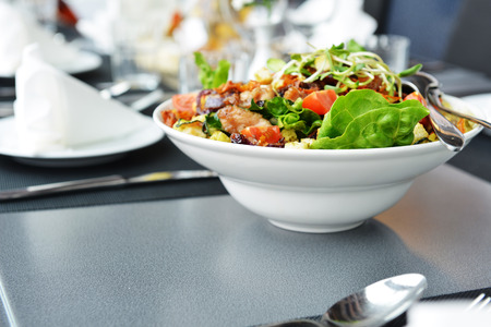 Fresh and tasty salad on plateの写真素材