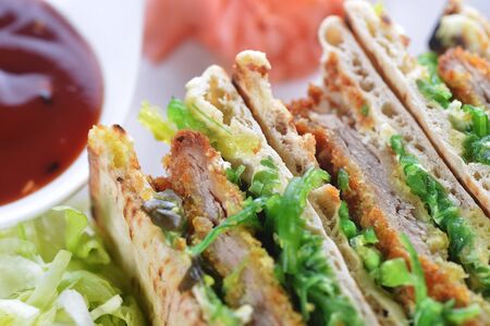 sandwiches with meat and vegetables on  plateの写真素材