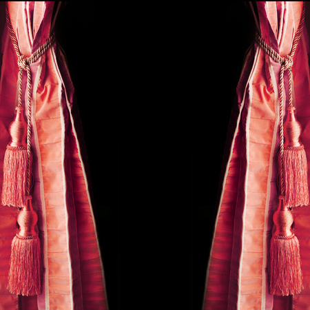 Fragment of portiere with  decorative brushの写真素材