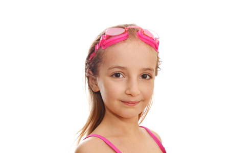 Cute  girl swimmer in  swimming costume and gogglesの写真素材