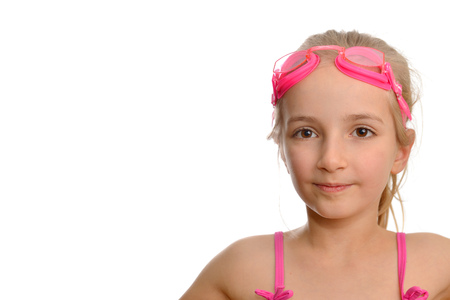 Cute  girl swimmer in  swimming costume and gogglesの写真素材