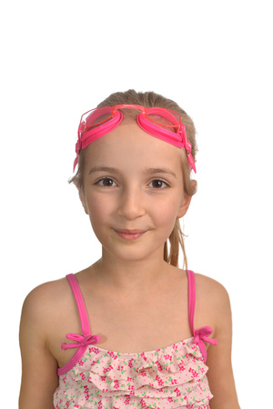 Cute  girl swimmer in  swimming costume and gogglesの写真素材