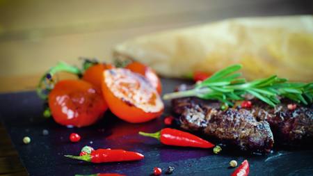 big tasty steak medium rare on stone plateの写真素材