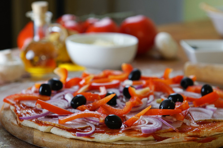 Baked pizza with diferent ingredientsの写真素材