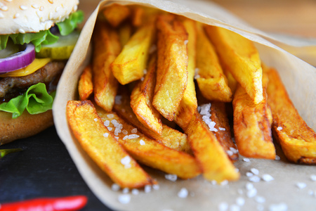 Tasty and appetizing hamburger with fries