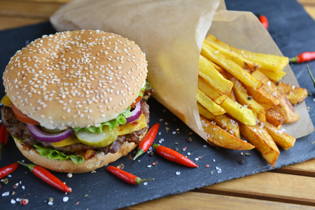 Tasty and appetizing hamburger with friesの写真素材