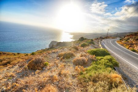 Beautiful mountain and sea landscape in eveningの写真素材