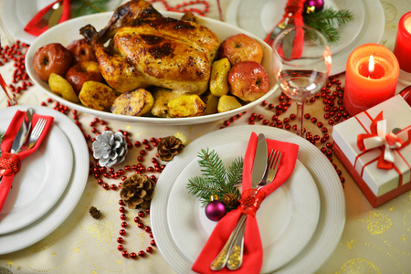 rich table setting for Christmas dinnerの写真素材