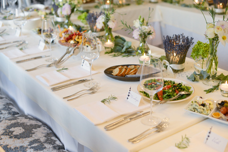 Wedding reception place ready for guests. table with food and drinkの写真素材