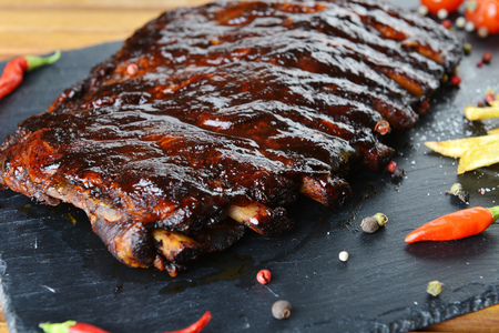 fried  pork ribs and hot pepper on  plateの写真素材