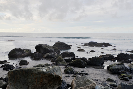 sky above rocks and stony coast. Sea landscapeの写真素材