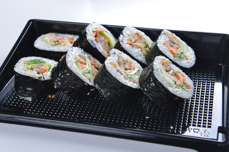 Delicious sushi rolls  on black backgroundの写真素材
