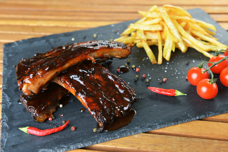 fried potatoes and pork ribs  plateの写真素材