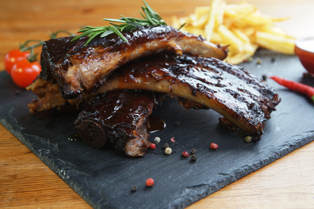 fried potatoes and pork ribs  plateの写真素材