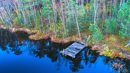 Beautiful autumn landscape of lake and treesの写真素材