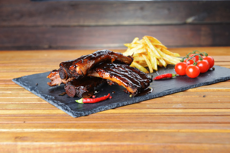 fried potatoes and pork ribs  plateの写真素材