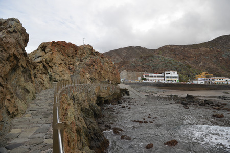 resort town on rocky coast of ocean.の写真素材