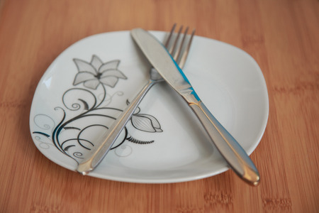 The position of cutlery after dinner tells somethingの写真素材