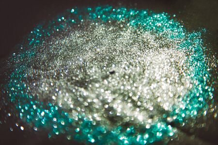 Oval made of bokeh, on black backgroundの写真素材