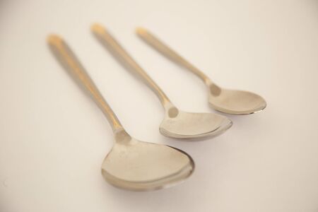 Three spoons of different sizesの写真素材