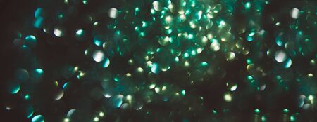 Abstract bokeh on black background like starsの写真素材