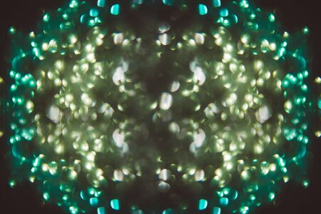 Oval made of bokeh, on black backgroundの写真素材