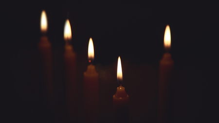 Candles on black backgroundの写真素材