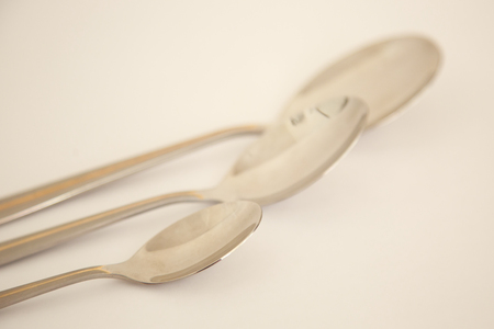 Three spoons of different sizesの写真素材