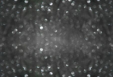 Silver bokeh backgroundの写真素材