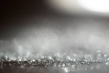 Background made of silver light leaksの写真素材