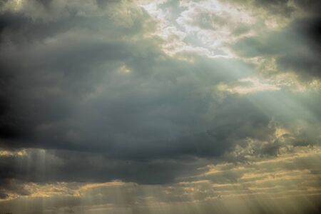 Sun rays in epic cloudsの写真素材