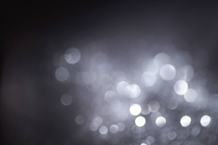 Background made of silver light leaksの写真素材