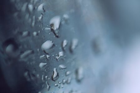 beads of water on a black backgroundの写真素材