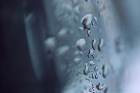 beads of water on a black backgroundの写真素材