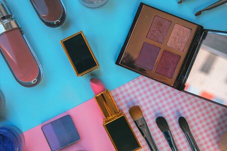 Set of decorative cosmetics on color backgroundの写真素材