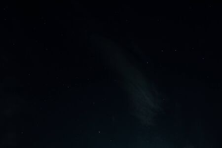 The moon and the stars in the night and cloudy sky. High quality photoの写真素材