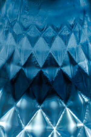 abstract blue background with some smooth lines in it and some reflectionsの写真素材