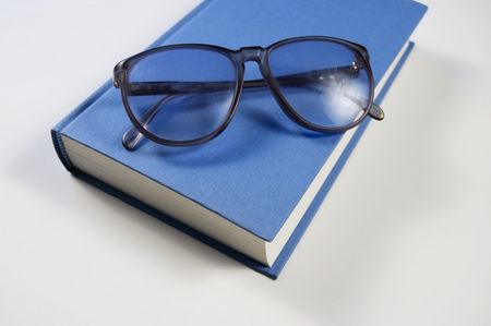 Book with eyeglassesの写真素材