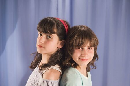 Portrait of two young girl sisterの写真素材