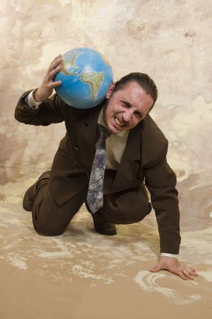 Businessman holding globe