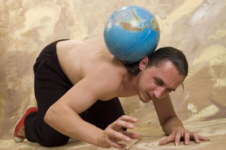 Man carry a globe on his back