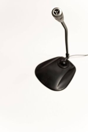 Close up of microphone equipment on white backgroundsの写真素材