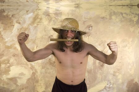 Savage man and hammerの写真素材