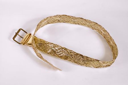 Females fashion golden belt on white backgroundsの写真素材