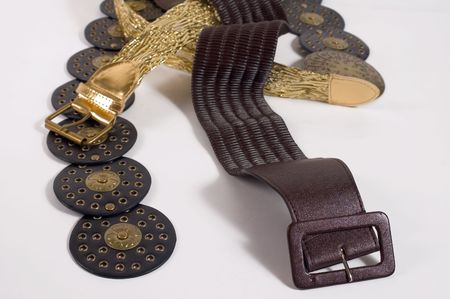 Females fashion belt on red backgrounds