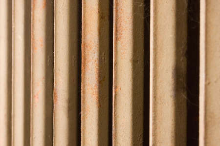 Old rusty radiator, focus on middle part of radiator, DOF is shalowの写真素材