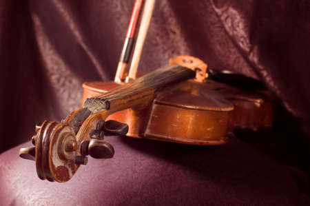 A vintage violin instrument on dark backgroundの写真素材