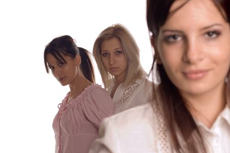 Portrait three girlfriends, first woman is not on focusの写真素材