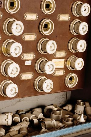 Manual electricity safety burnt fuse from ceramic on circuit boardの写真素材